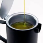 Colaboración pionera: aplican una transformación de aceite usado en jabón biodegradable líquido para lavadora